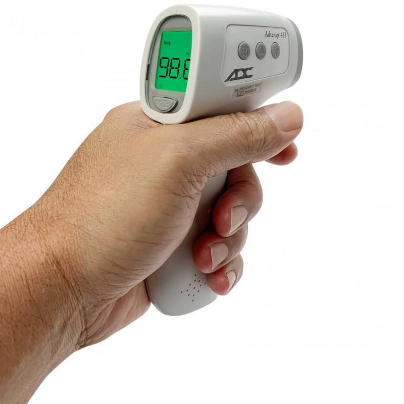 ADC Adtemp 433 Non-Contact Thermometer in hand